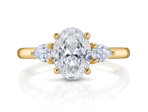 Oval and Pear Diamond Three-Stone Engagement Ring