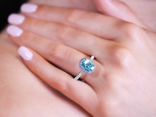 Paraiba Tourmaline and Diamond Halo Ring in Platinum